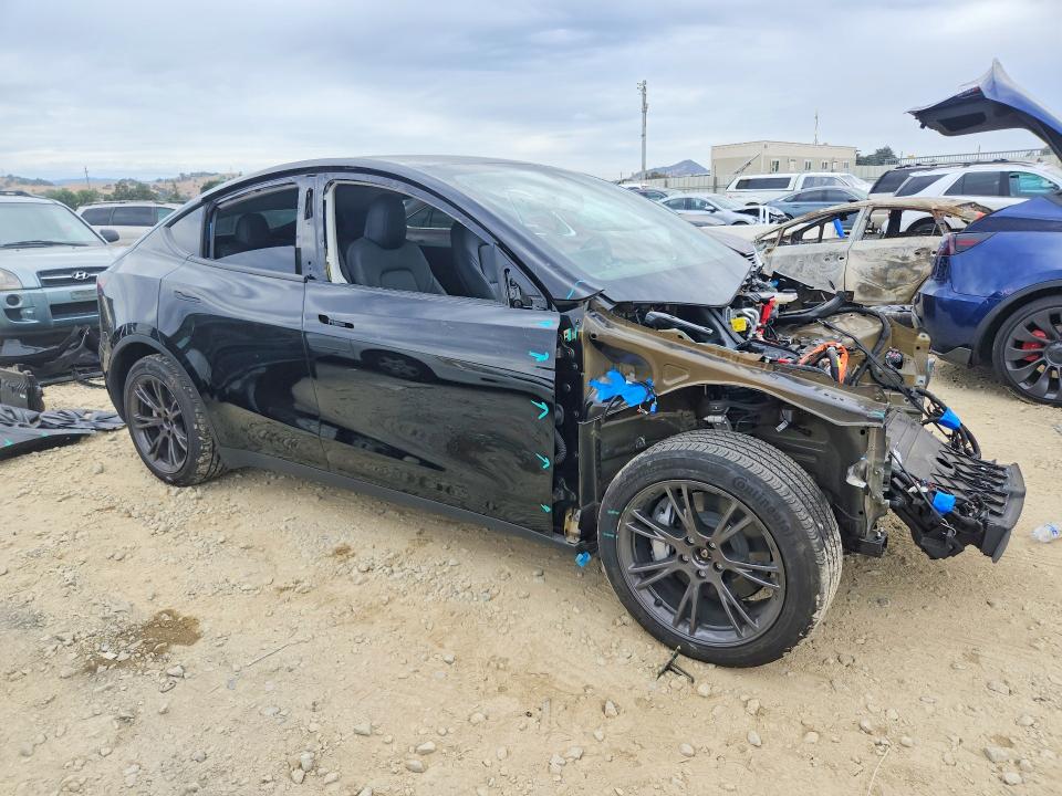 Photo 4 from auction – 2025 TESLA MODEL Y with VIN 7SAYGAEE7SF289877