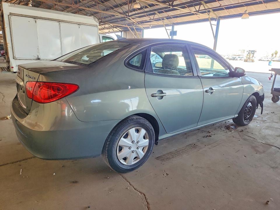 Photo 3 from auction – 2010 HYUNDAI ELANTRA with VIN KMHDU4AD9AU979974