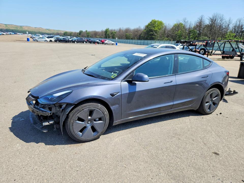 TESLA MODEL 3 2023 with VIN 5YJ3E1EA7PF667620 - Photo from auction