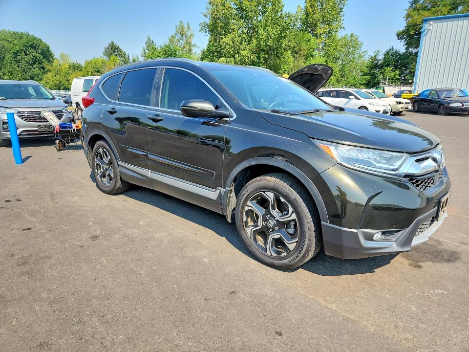 Photo 4 from auction – 2017 HONDA CR-V with VIN 2HKRW2H91HH626403