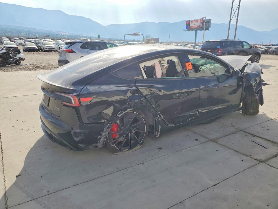 Снимка 3 от търг – 2025 TESLA MODEL 3 с VIN 5YJ3E1ETXSF072738
