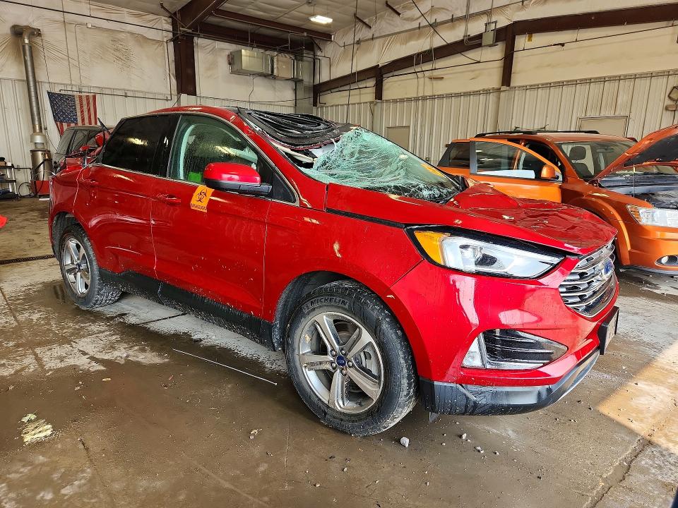 Photo 4 from auction – 2021 FORD EDGE with VIN 2FMPK4J95MBA63124