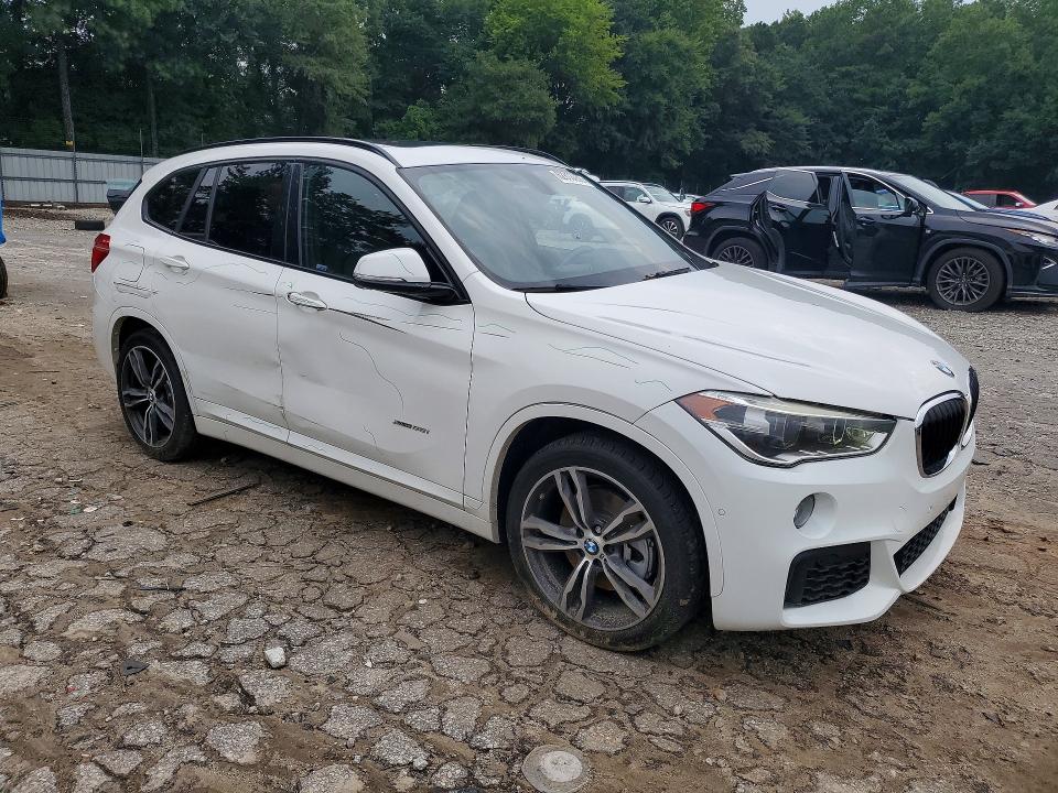 Photo 4 from auction – 2016 BMW X1 with VIN WBXHT3C38G5E56204
