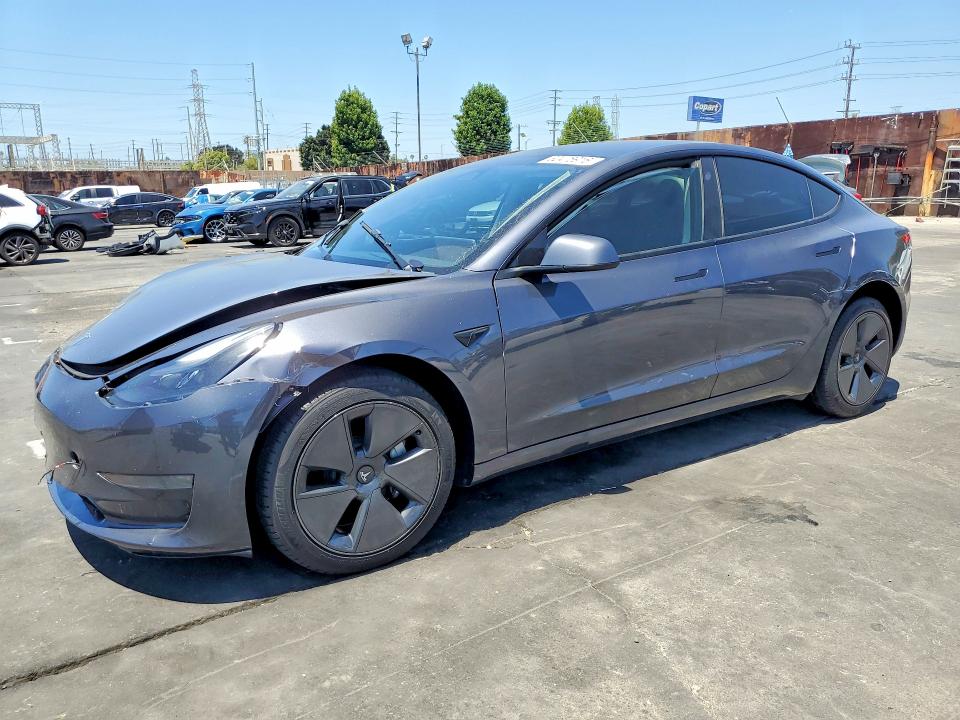 TESLA MODEL 3 2023 with VIN 5YJ3E1EA3PF613778 - Photo from auction