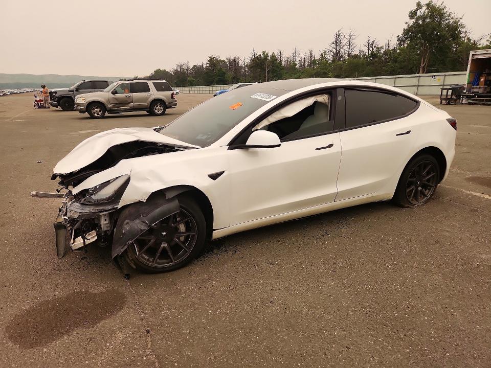 TESLA MODEL 3 2021 with VIN 5YJ3E1EA4MF915950 - Photo from auction