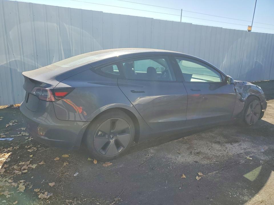 Снимка 3 от търг – 2023 TESLA MODEL 3 с VIN 5YJ3E1EA6PF419259