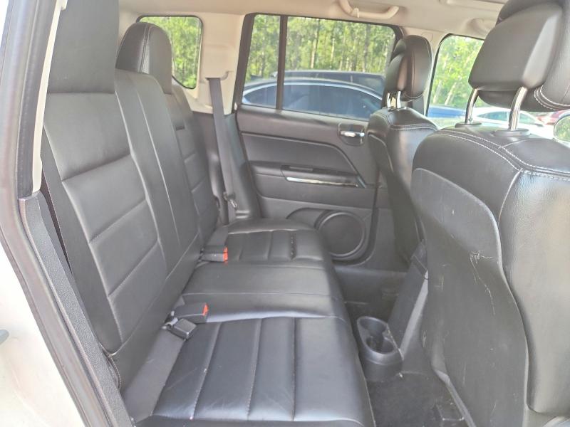 Photo 11 from auction – 2010 JEEP COMPASS with VIN 1J4NF5FB8AD563277