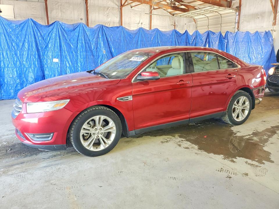FORD TAURUS 2014 with VIN 1FAHP2E86EG100309 - Photo from auction