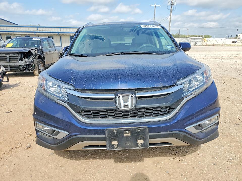 Photo 5 from auction – 2016 HONDA CR-V with VIN 5J6RM3H79GL021124