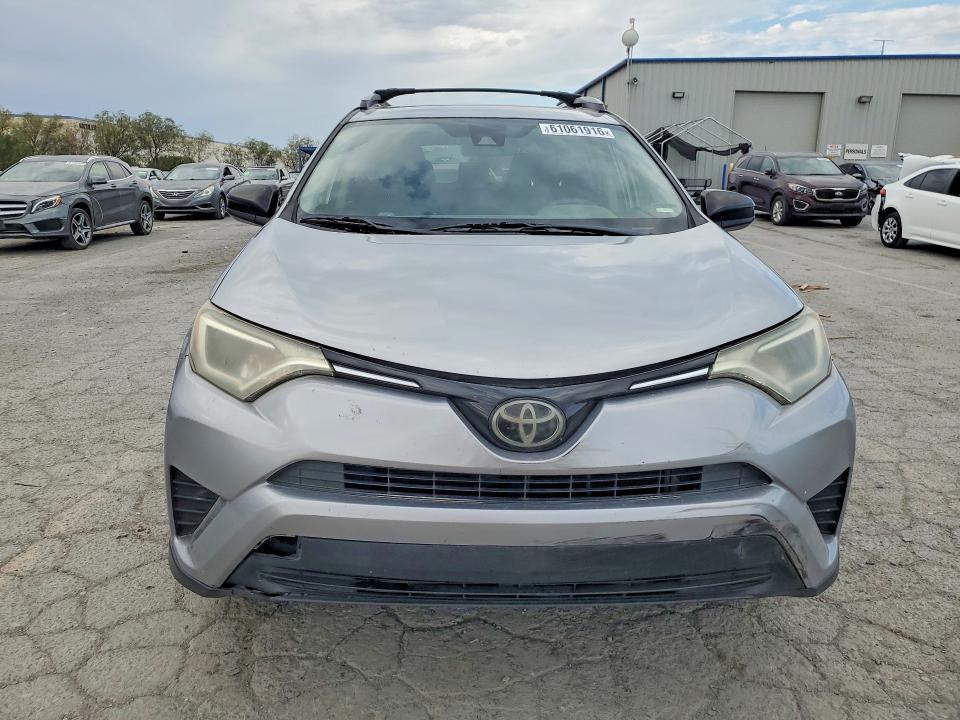 Photo 5 from auction – 2018 TOYOTA RAV4 with VIN JTMZFREV2JJ210187