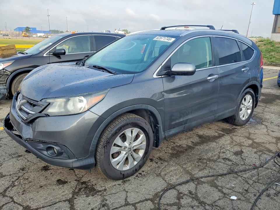 HONDA CR-V 2013 with VIN 2HKRM4H98DH114567 - Photo from auction