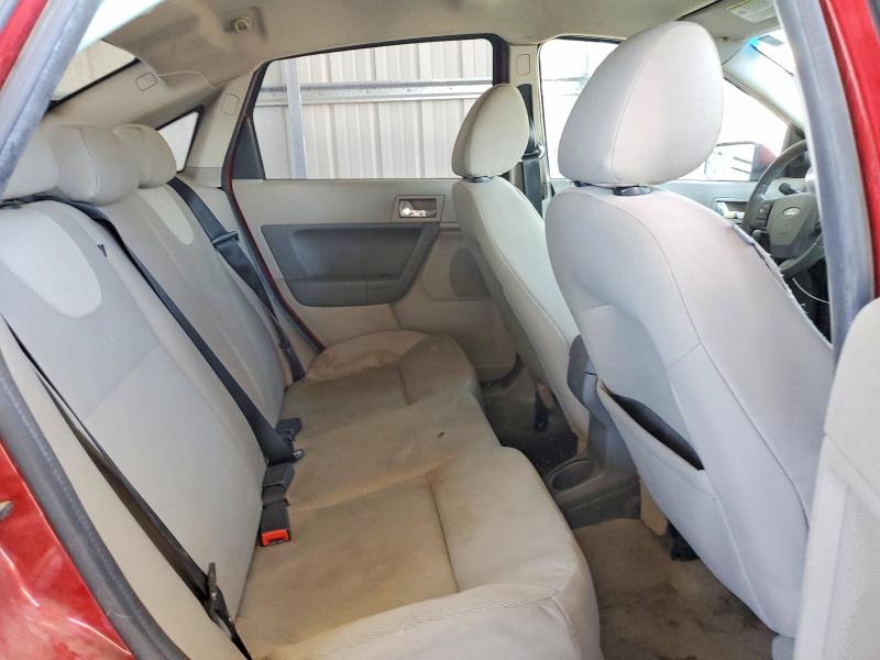 Photo 10 from auction – 2009 FORD FOCUS with VIN 1FAHP36N99W210647
