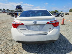 Photo 6 from auction – 2014 TOYOTA COROLLA with VIN 5YFBURHE1EP050579