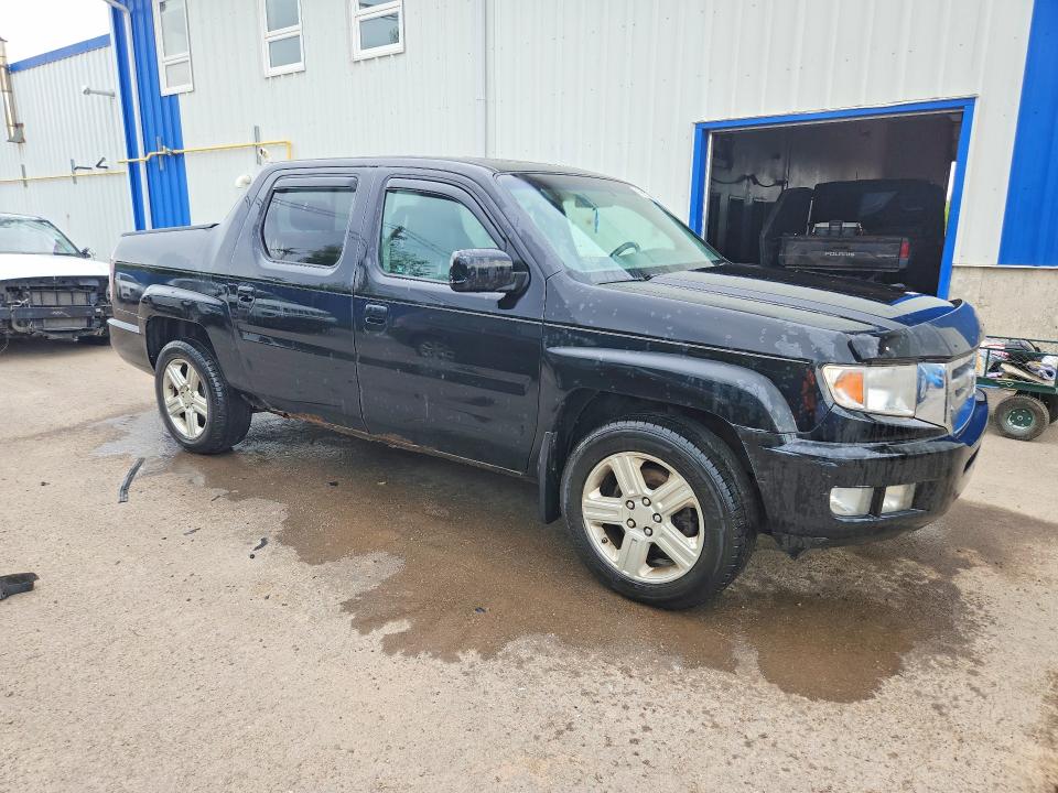 Photo 4 from auction – 2010 HONDA RIDGELINE with VIN 5FPYK1F59AB001471