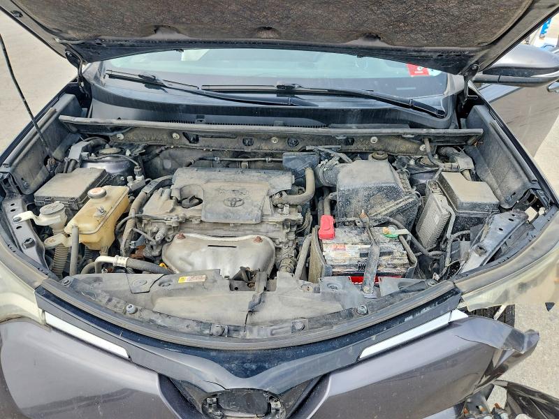 Photo 12 from auction – 2018 TOYOTA RAV4 with VIN JTMRFREV6JJ742459