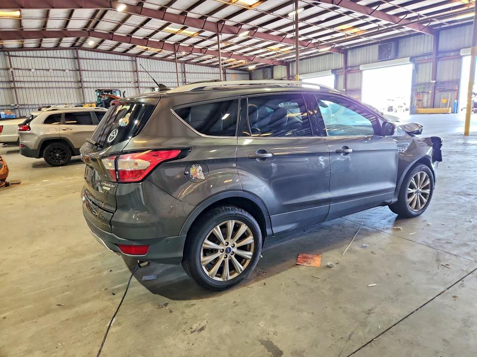 Photo 3 from auction – 2018 FORD ESCAPE with VIN 1FMCU0J93JUC32211