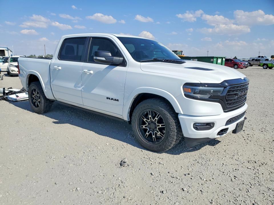 Photo 4 from auction – 2021 RAM 1500 with VIN 1C6SRFHT2MN623250