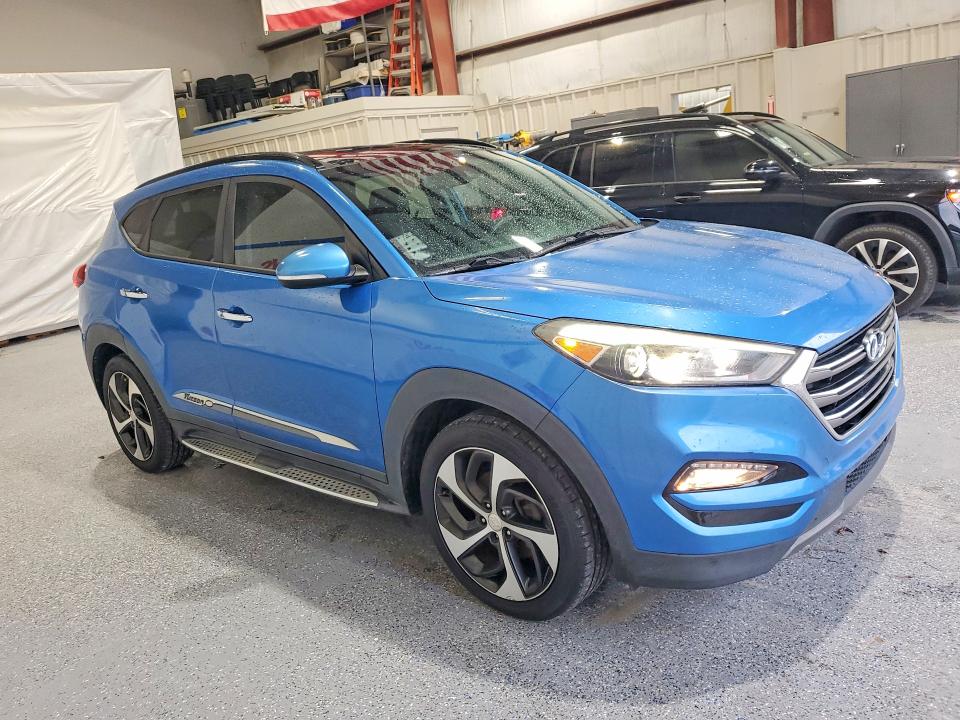 Photo 4 from auction – 2016 HYUNDAI TUCSON with VIN KM8J33A2XGU182429