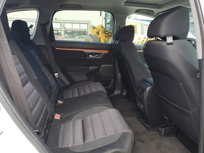 Photo 11 from auction – 2018 HONDA CR-V with VIN 2HKRW2H56JH694750