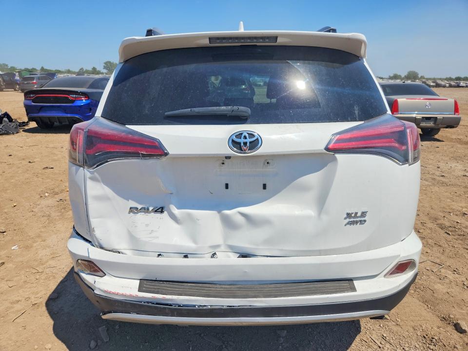 Photo 6 from auction – 2017 TOYOTA RAV4 with VIN JTMRFREV8HD207271