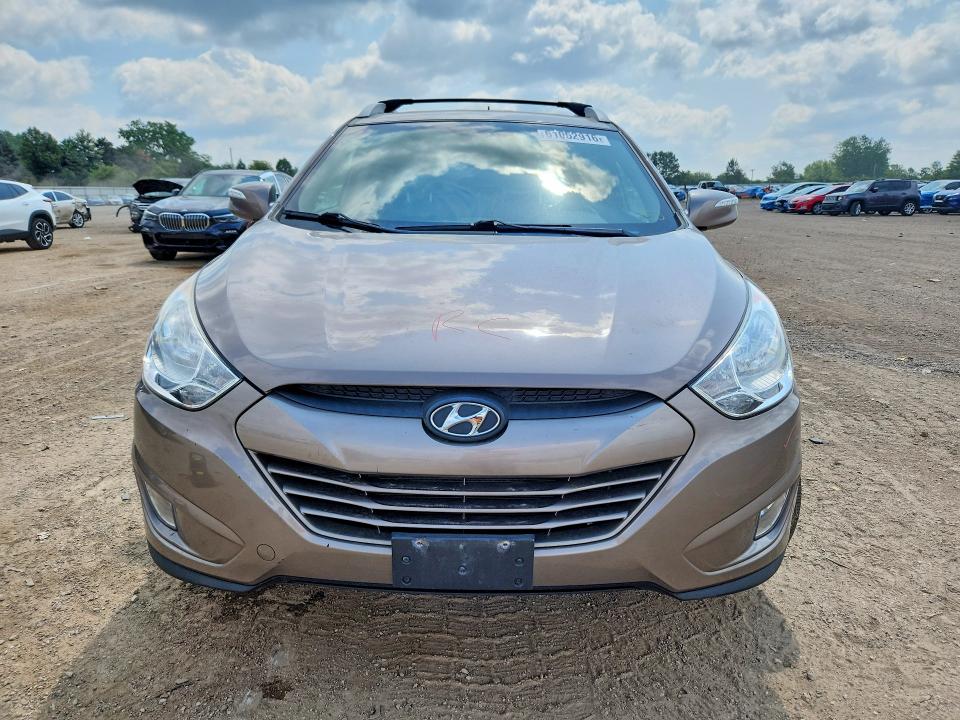 Photo 5 from auction – 2013 HYUNDAI TUCSON with VIN KM8JUCAC0DU622823