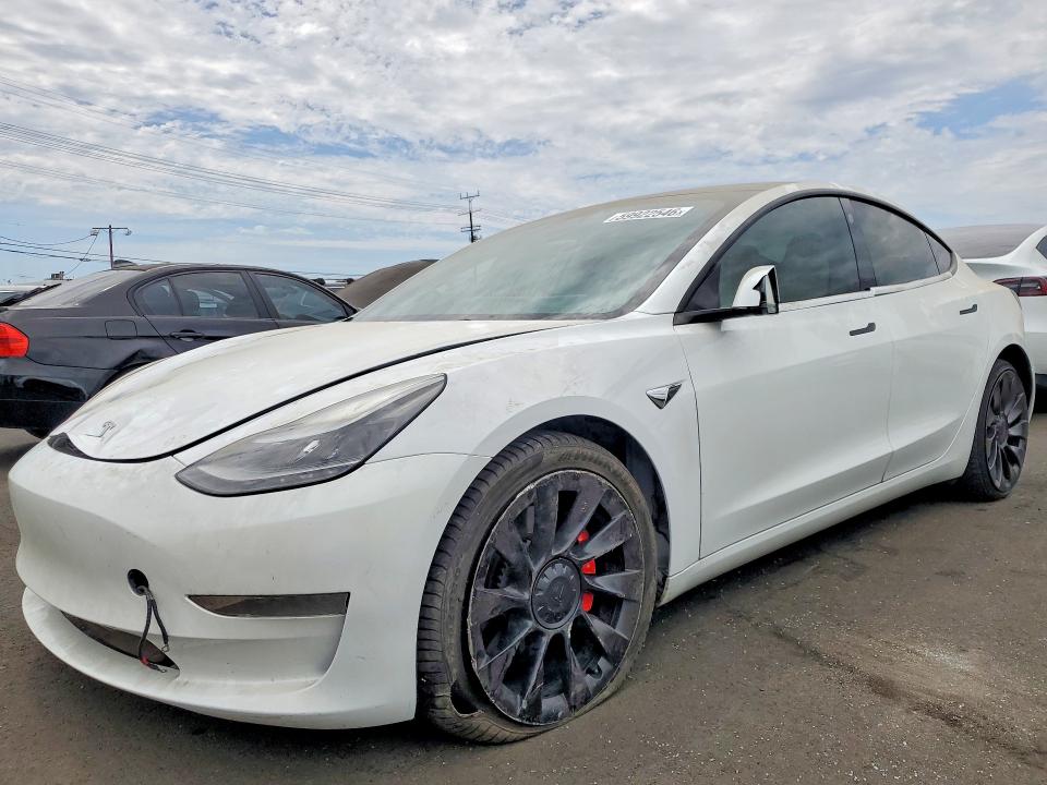 TESLA MODEL 3 2022 with VIN 5YJ3E1EC2NF208655 - Photo from auction