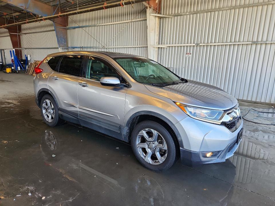 Photo 4 from auction – 2017 HONDA CR-V with VIN 7FARW1H89HE012235