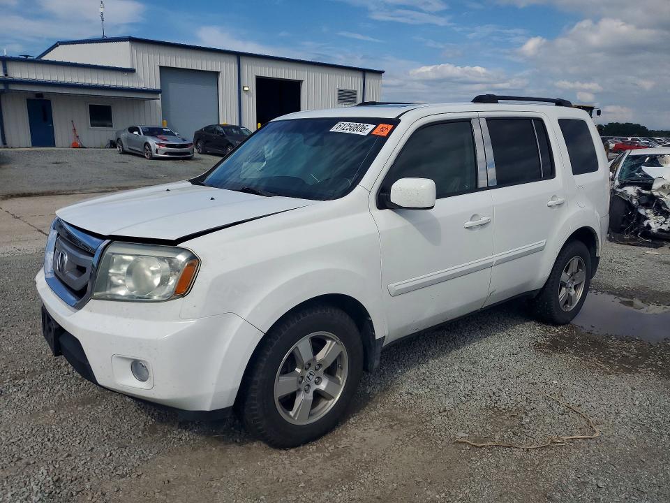 HONDA PILOT 2011 with VIN 5FNYF4H68BB104256 - Photo from auction