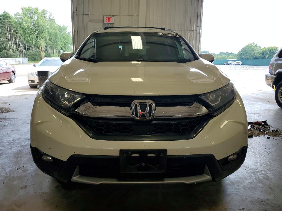 Photo 5 from auction – 2018 HONDA CR-V with VIN 2HKRW2H52JH672017