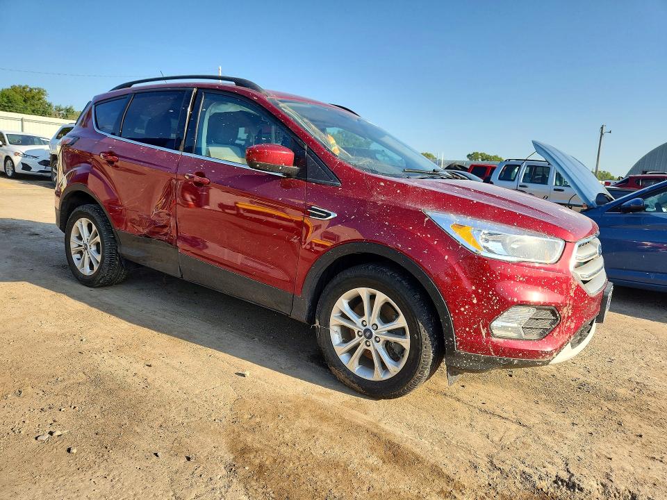 Photo 4 from auction – 2018 FORD ESCAPE with VIN 1FMCU9GD0JUD31455