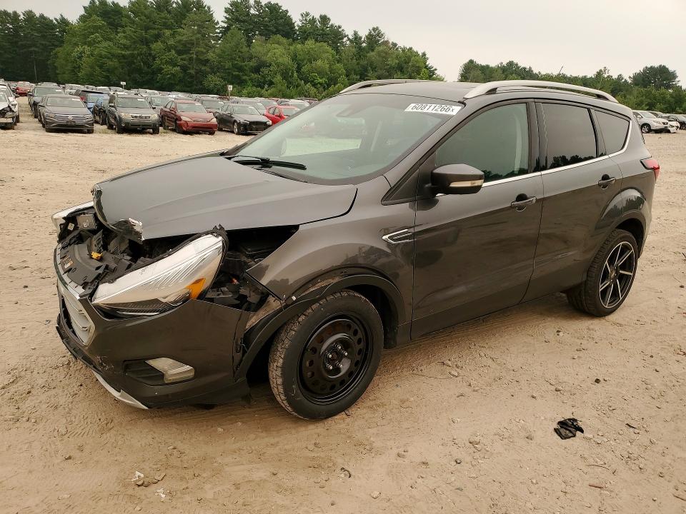FORD ESCAPE 2019 with VIN 1FMCU9J92KUB73447 - Photo from auction