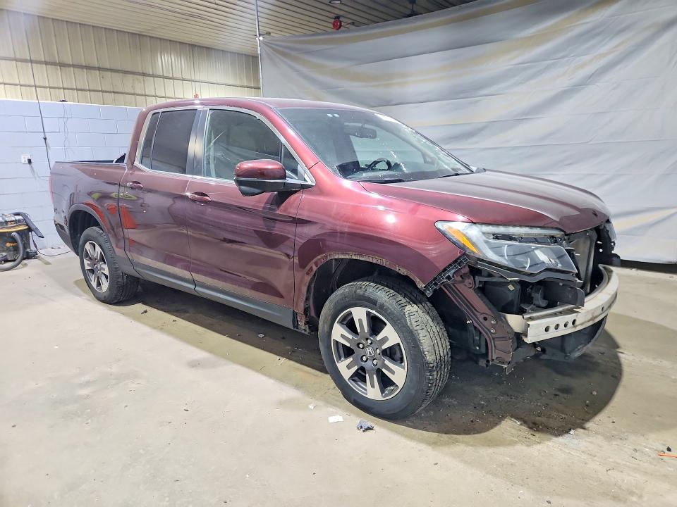 Photo 4 from auction – 2019 HONDA RIDGELINE with VIN 5FPYK3F6XKB033593