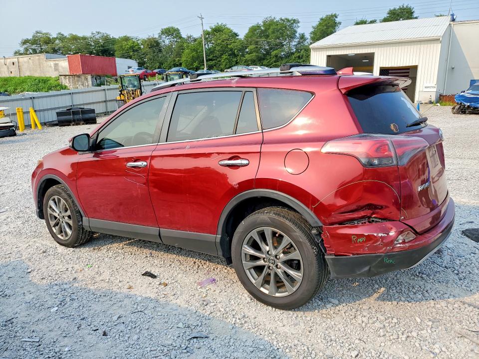 Photo 2 from auction – 2018 TOYOTA RAV4 with VIN JTMYFREVXJD128587