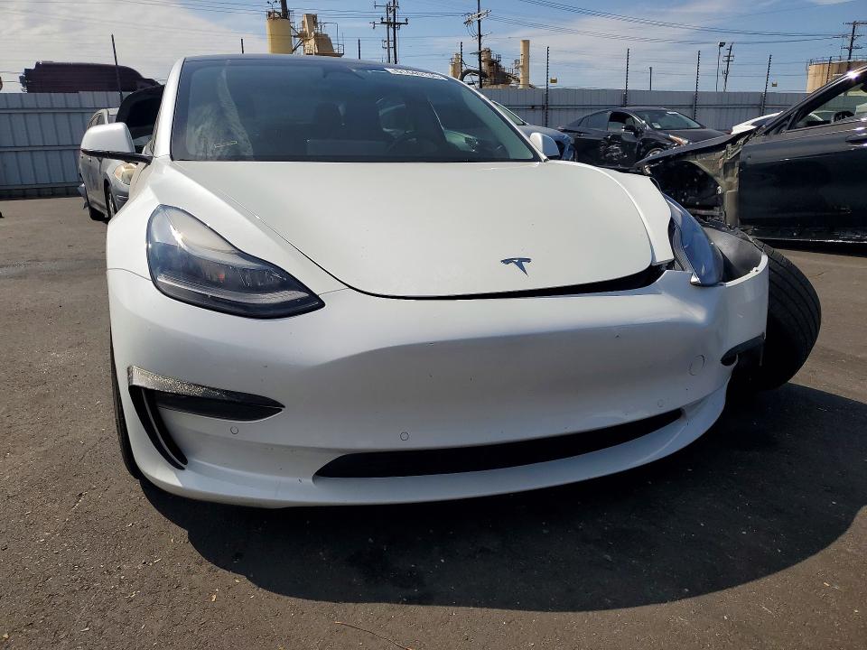 Photo 5 from auction – 2022 TESLA MODEL 3 with VIN 5YJ3E1EB8NF184417