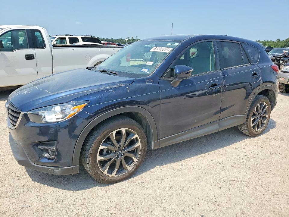 MAZDA CX-5 2016 with VIN JM3KE2DY1G0841140 - Photo from auction
