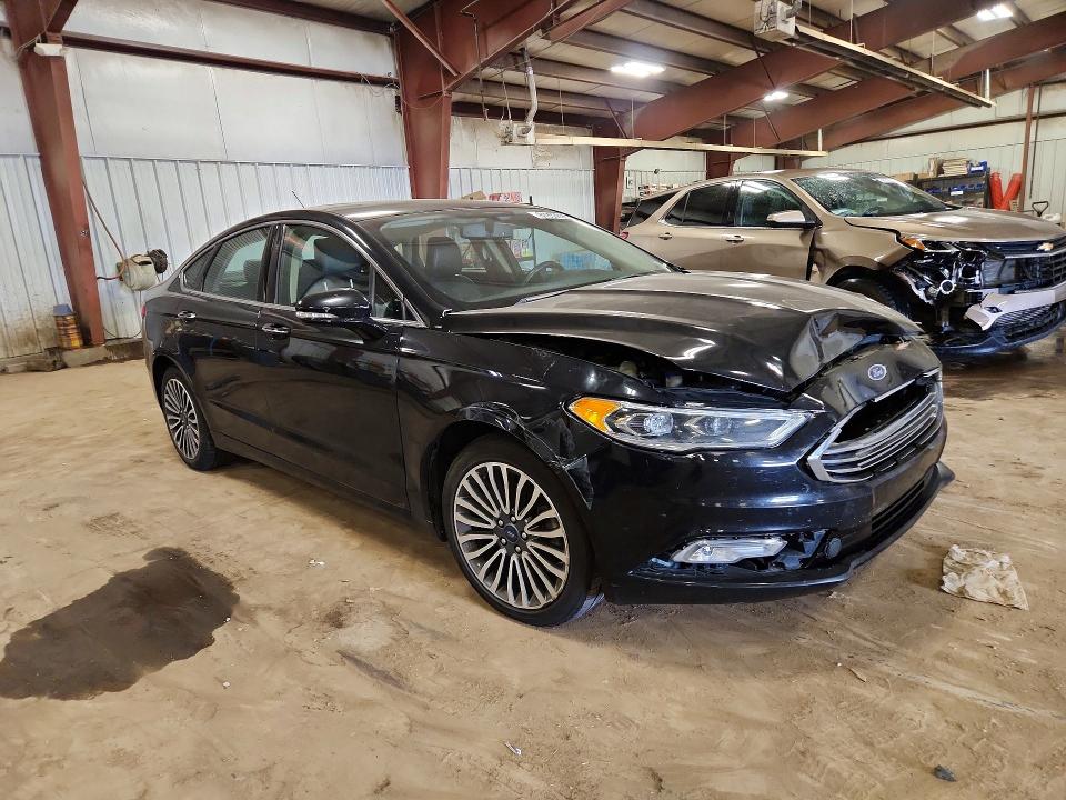 Photo 4 from auction – 2017 FORD FUSION with VIN 3FA6P0T91HR100884