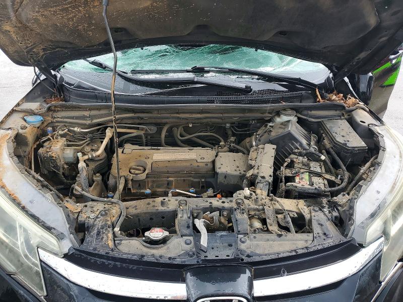 Photo 12 from auction – 2015 HONDA CR-V with VIN 2HKRM3H57FH530989