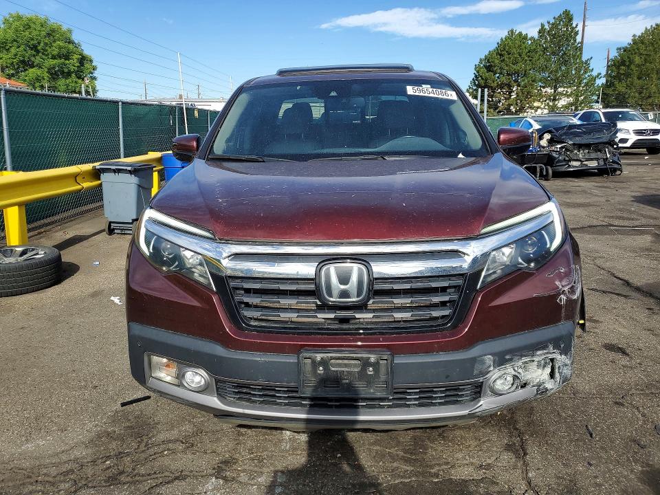 Photo 5 from auction – 2017 HONDA RIDGELINE with VIN 5FPYK3F7XHB012308