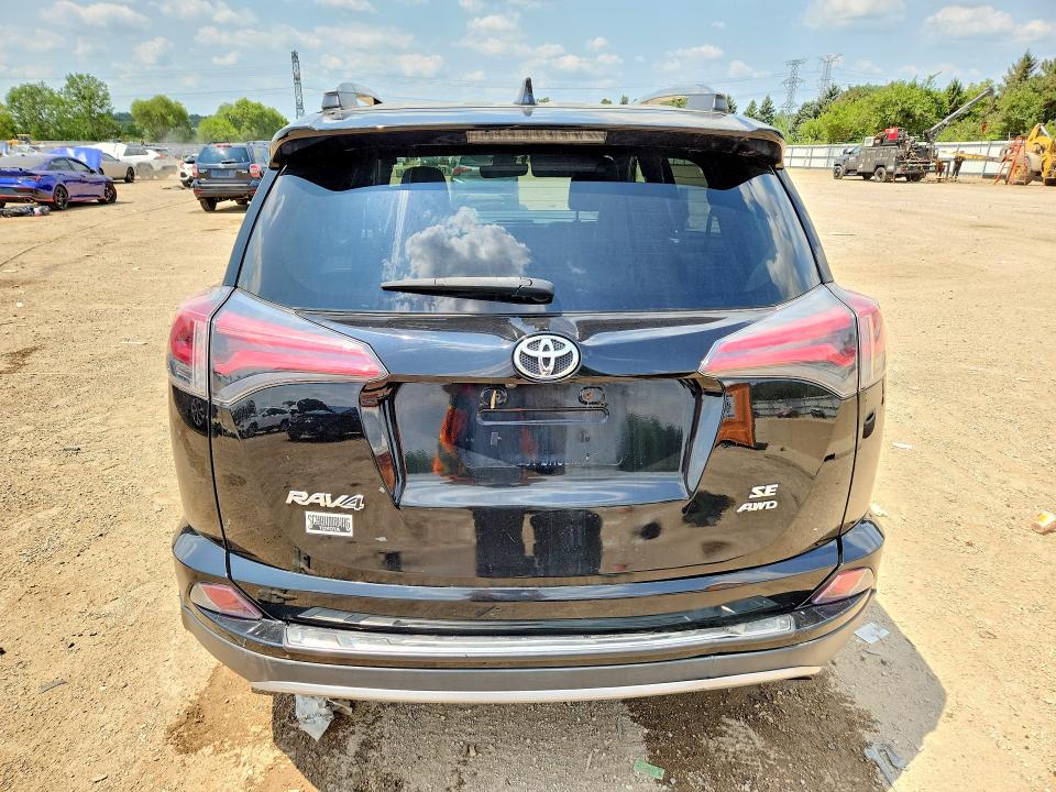 Photo 6 from auction – 2018 TOYOTA RAV4 with VIN 2T3JFREVXJW785698