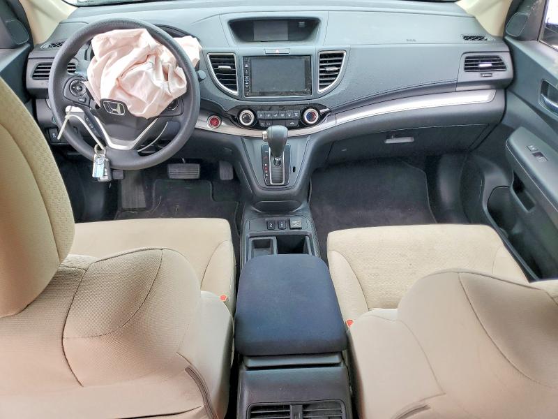 Photo 8 from auction – 2015 HONDA CR-V with VIN 5J6RM4H55FL125127