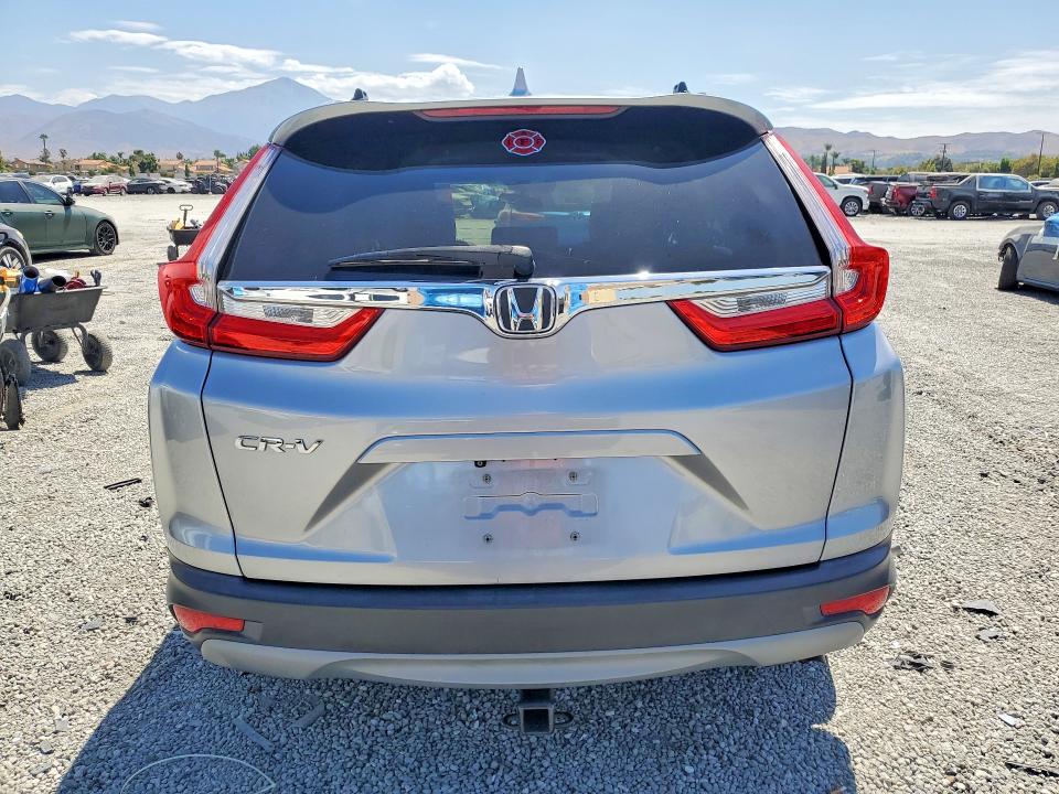 Photo 6 from auction – 2017 HONDA CR-V with VIN 7FARW1H59HE005582
