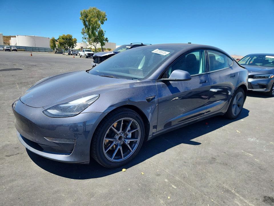 TESLA MODEL 3 2023 with VIN 5YJ3E1EAXPF640055 - Photo from auction