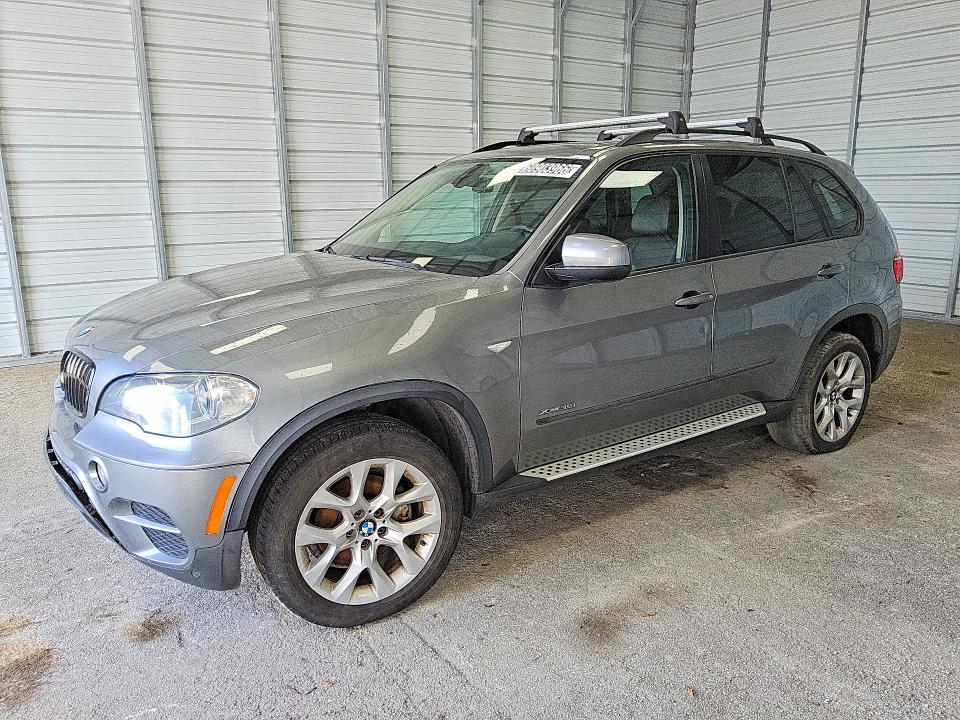 BMW X5 2012 with VIN 5UXZV4C51CL752203 - Photo from auction