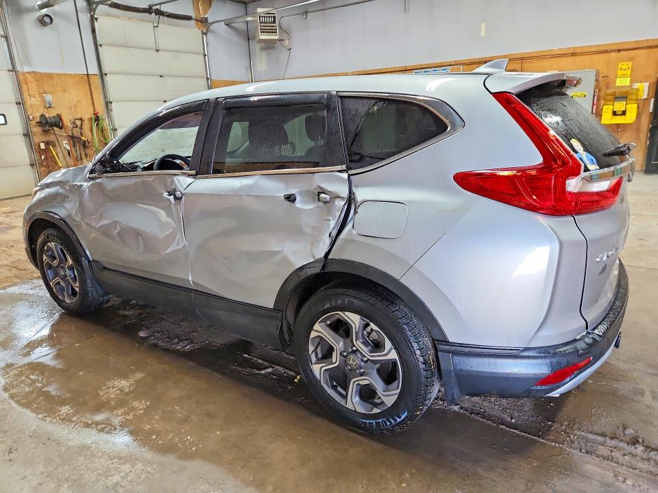 Photo 2 from auction – 2018 HONDA CR-V with VIN 7FARW2H51JE089649