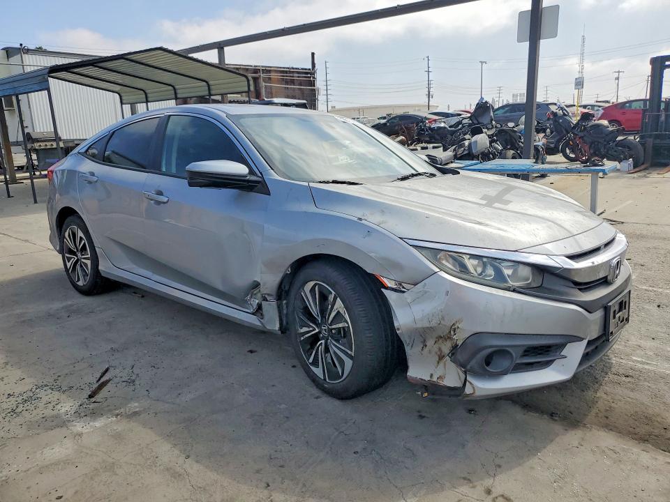 Photo 4 from auction – 2016 HONDA CIVIC with VIN 2HGFC1F71GH641953