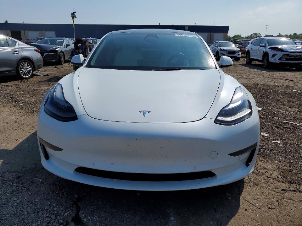 Photo 5 from auction – 2022 TESLA MODEL 3 with VIN 5YJ3E1EC4NF297693