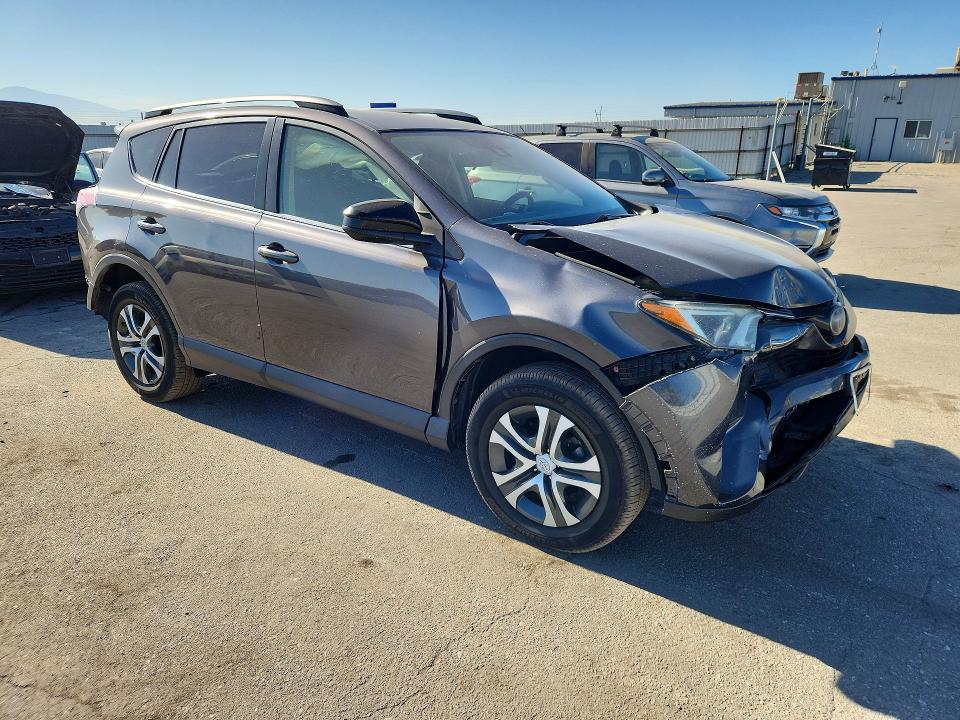 Photo 4 from auction – 2018 TOYOTA RAV4 with VIN JTMZFREV8JJ200974