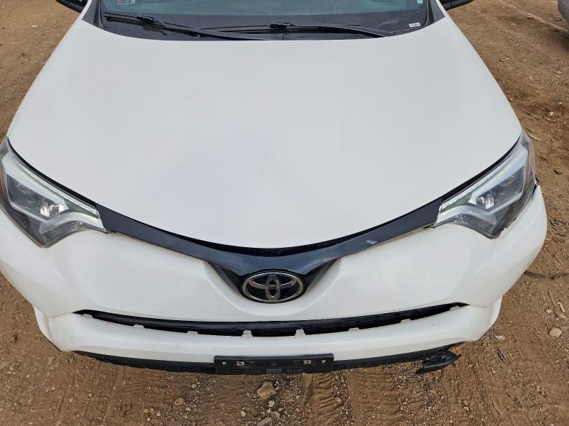 Photo 11 from auction – 2018 TOYOTA RAV4 with VIN 2T3JFREV8JW736516
