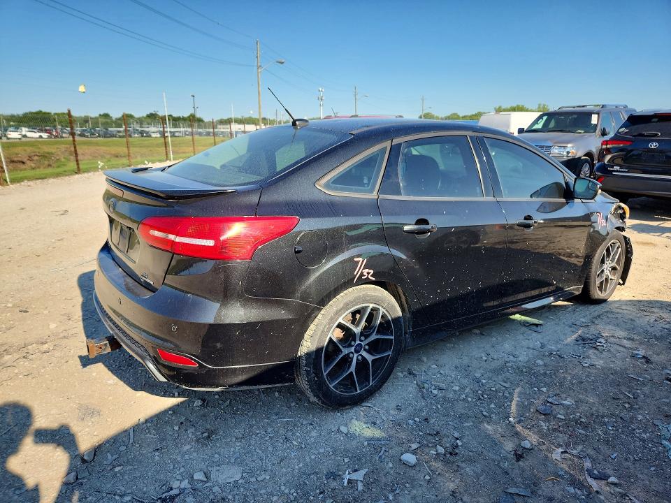 Photo 3 from auction – 2015 FORD FOCUS with VIN 1FADP3F24FL340627