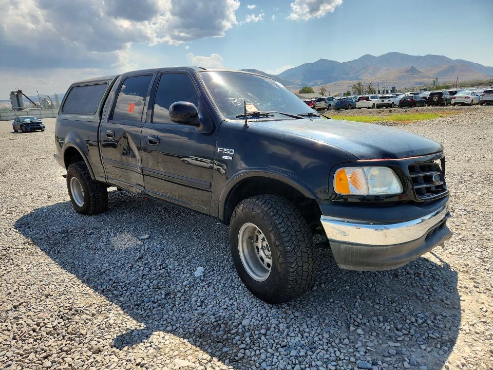 Photo 4 from auction – 2001 FORD F150 with VIN 1FTRW08L01KB55674